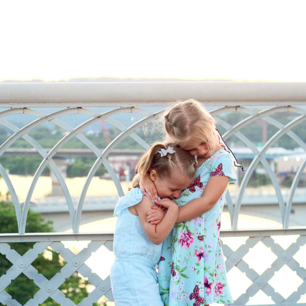 Love these sweet sisters and how much they love to explore together. (Walnut Street Walking Bridge, Chattanooga, TN)