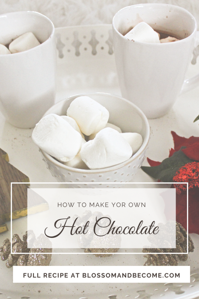 Cups of hot chocolate and marshmallows