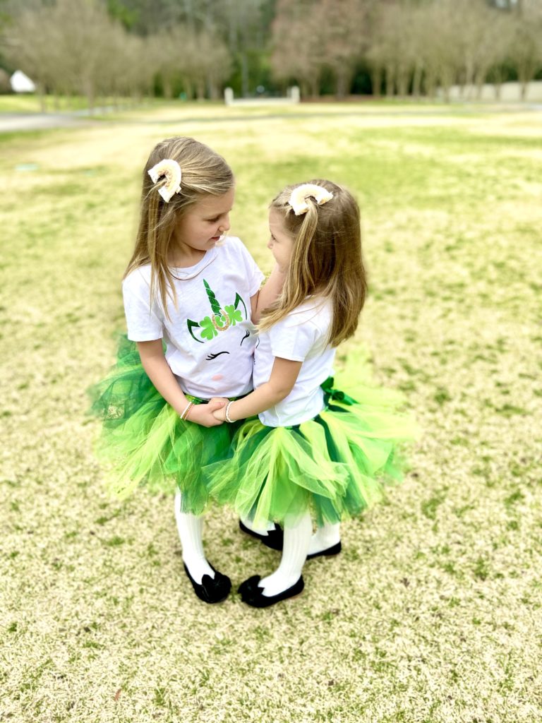 Little girls dressed up in tutus for St. Patrick's Day
