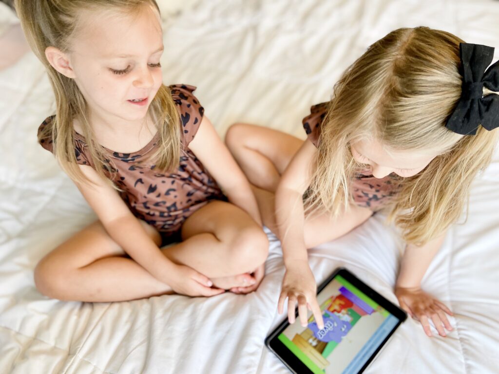 Kids playing game to learn to read